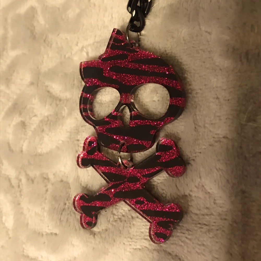 Long chain pink glitter reversible skull necklace